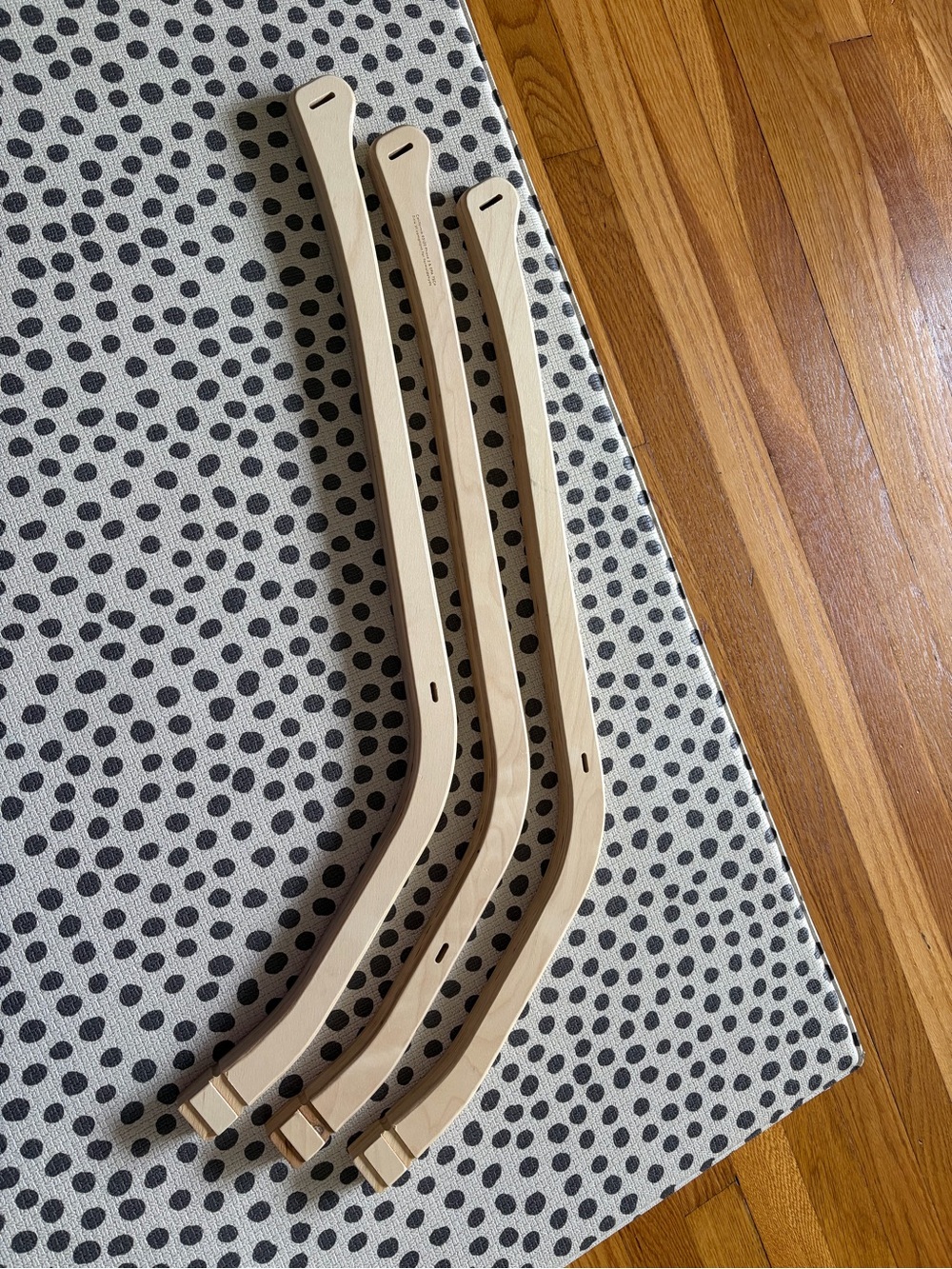 Lovevery wooden arms for bay play mat